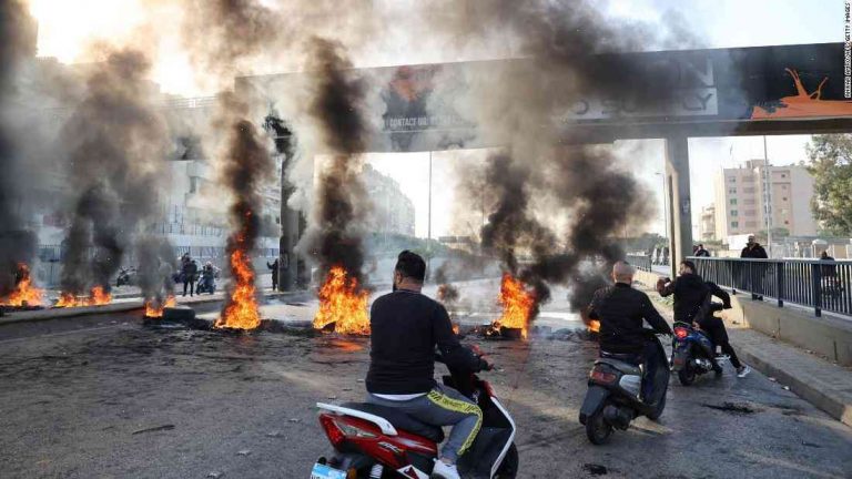 Lebanese, Syrian migrants protest in Beirut roads
